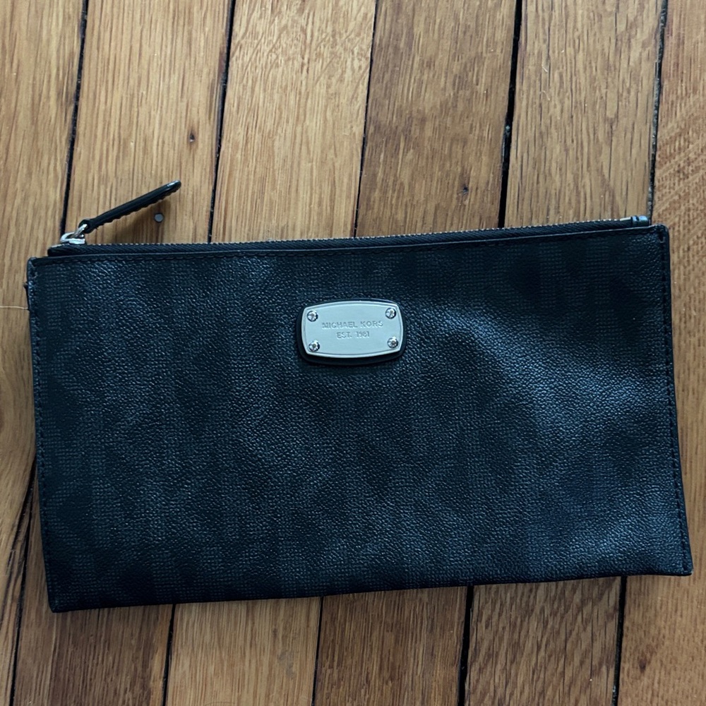 Michael Kors Black clutch.